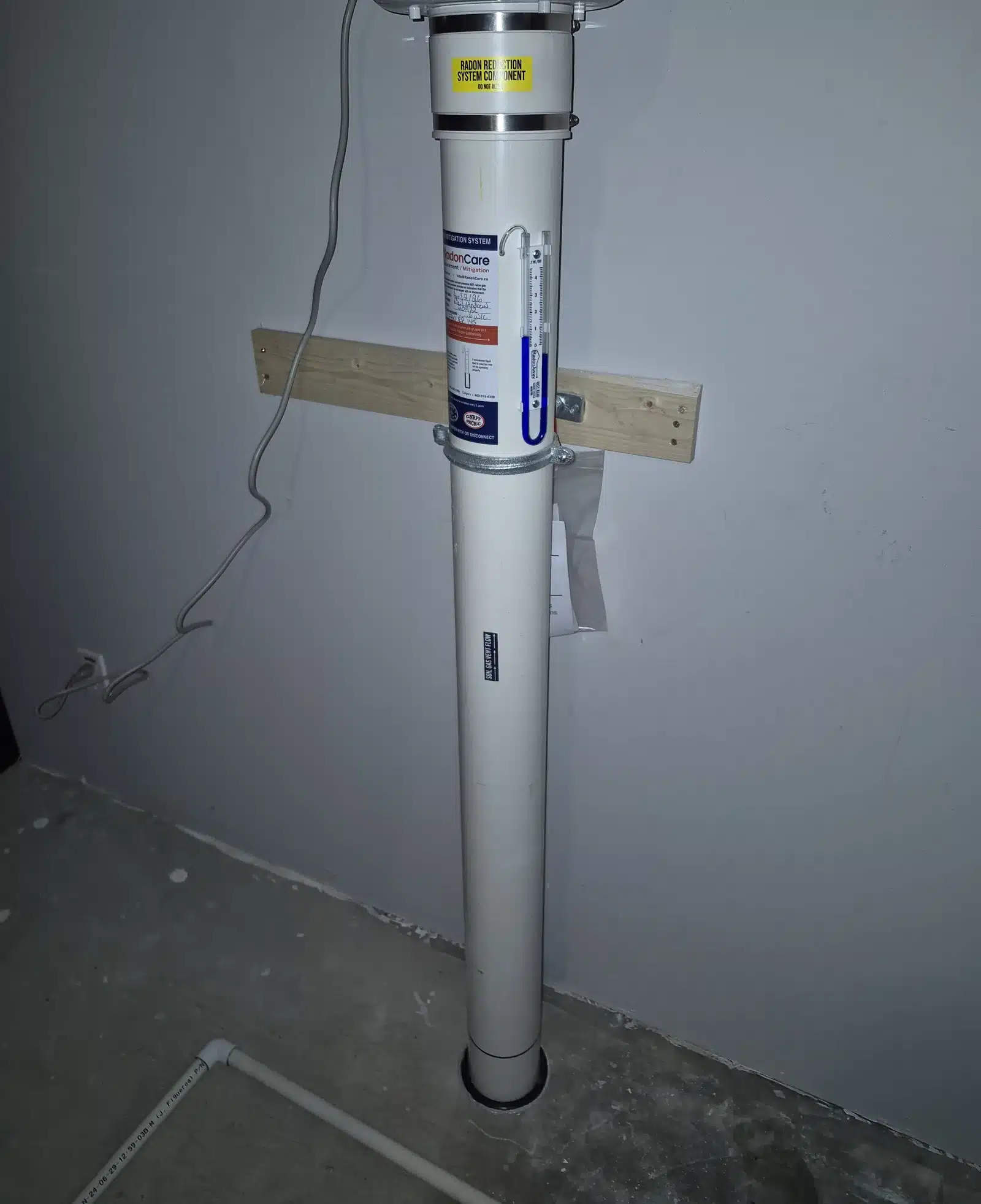 Radon Pipe Sealed Where It Enters The Basement Floor Of A Northwest Airdrie Home
