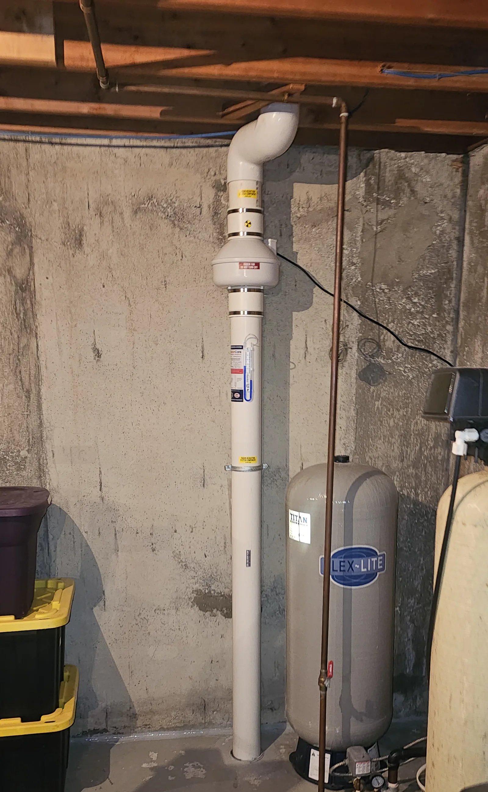 Radon Pipe And Fan On A Concrete Basement Wall, From A Similar Install In Bragg Creek