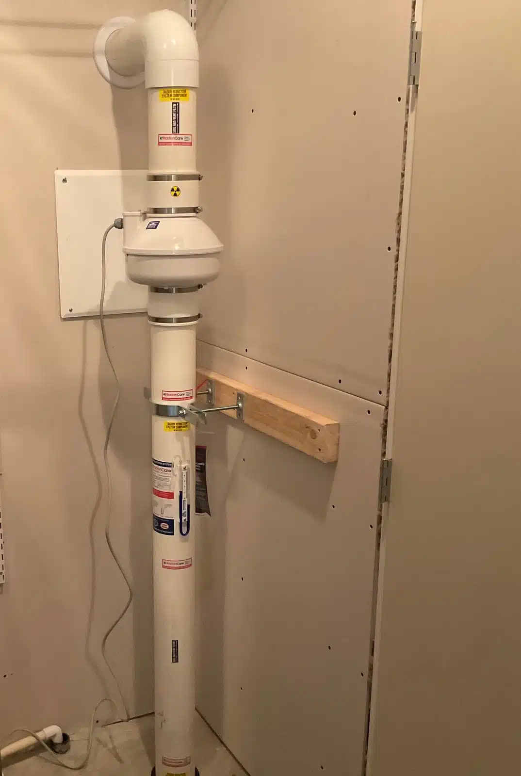 Radon Fan And Labelled Vent Pipe In A Salmon Arm Furnace Room